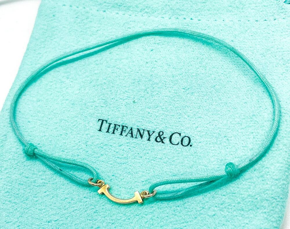 Tiffany & Co. T Smile Bracelet 18K Yellow Gold Blue Cord Adjustable 6-7.25"